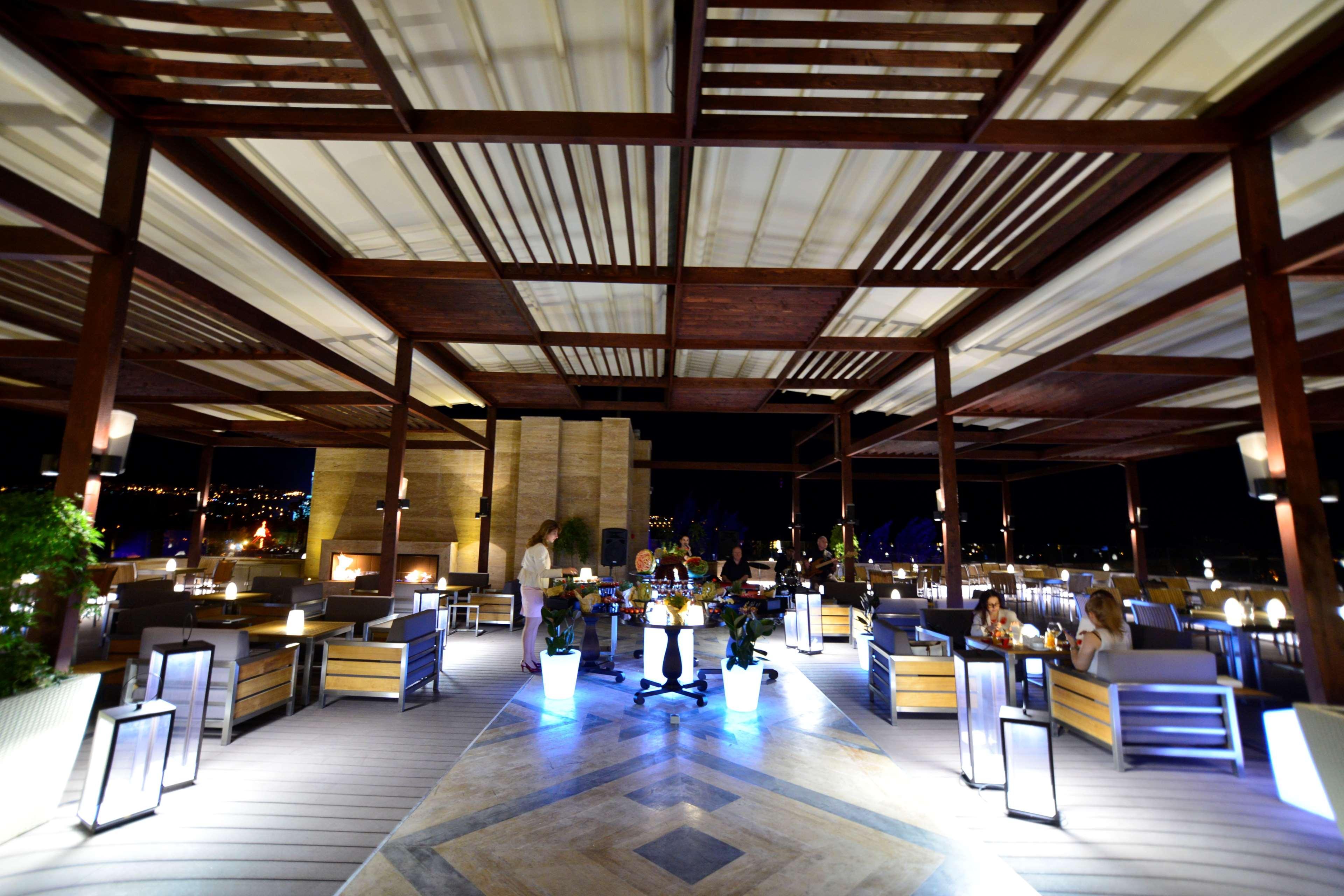 Radisson Blu Hotel Yerevan Exterior photo The restaurant at the top of the hotel